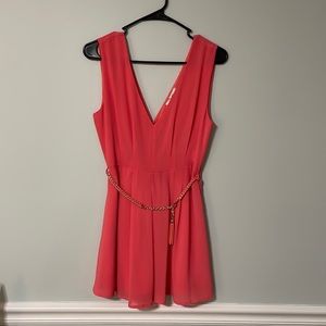 Coral romper with gold twisted belt. Papaya brand. Size medium